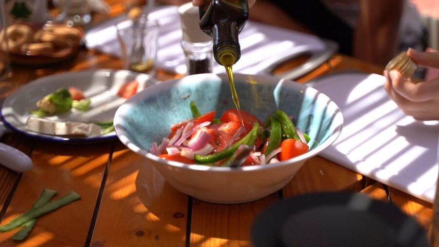 Argassi: Zakynthian Culture & Greek Cooking Class with Lunch - Lunch in the shaded Green Frog garden