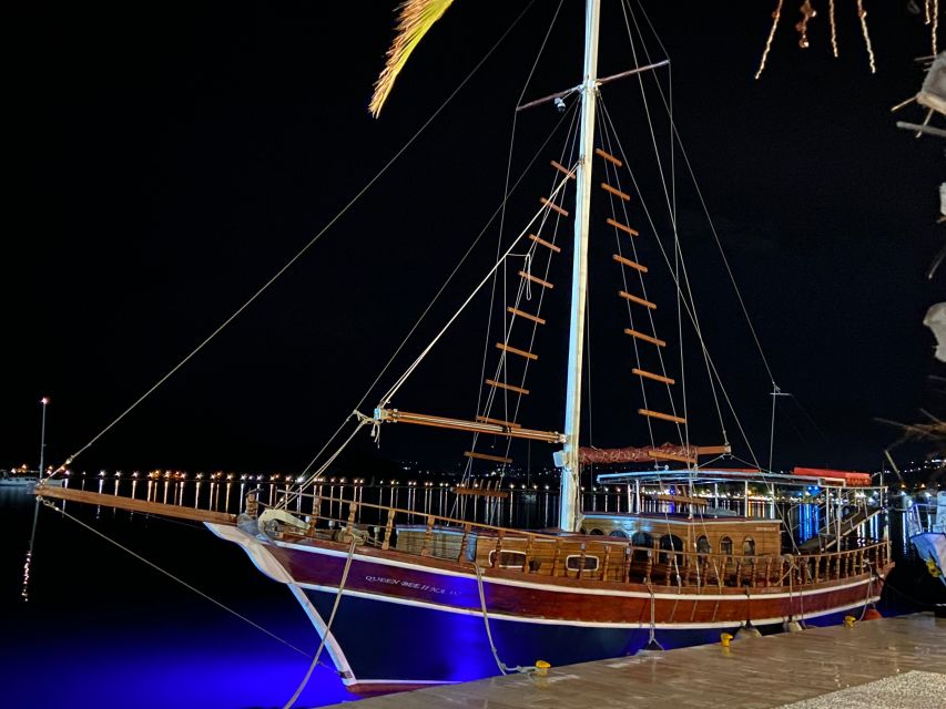 Argostoli: Sunset Cruise with Swim Stops, Dinner, and Wine - Dinner on deck as the sun drops