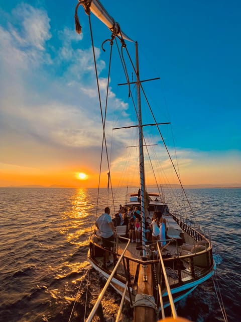 Athens: 3-Hour Sunset Cruise with Swim Stop, Snacks & Drinks - The first hour: coastal views, music, and a welcome drink