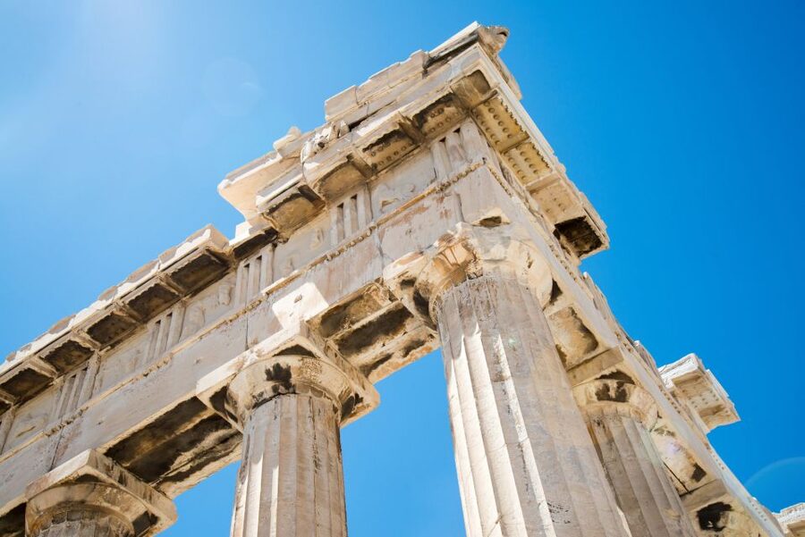 The Erechtheion porch on the Acropolis against a clear sky