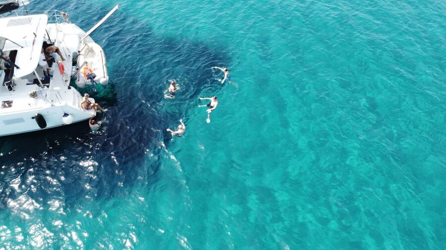 Athens: Catamaran Cruise with Fresh Lunch and Wine - Hydroussa islet: your first swim stop