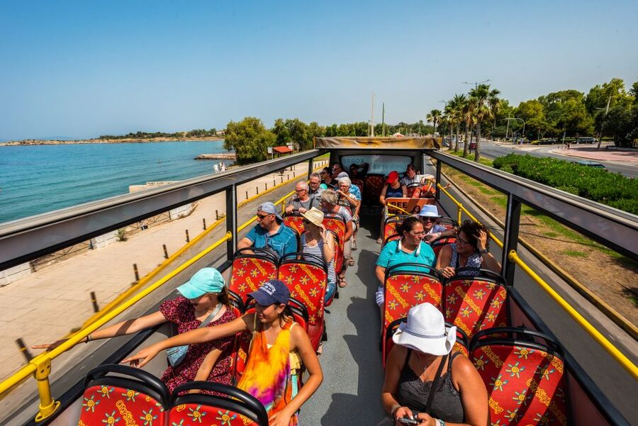 Athens: City Sightseeing Hop-On Hop-Off Bus Tour - National Library, Omonoia, and Monastiraki show modern Athens