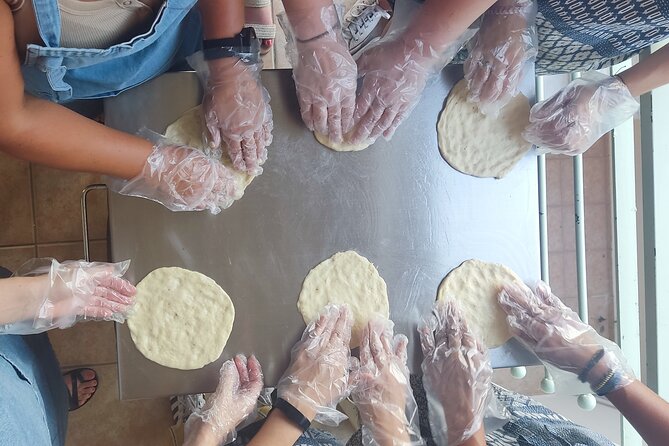 Athens Greek Cooking Class Pita Gyros from Scratch with a Local - Rolling and cooking pita bread from scratch