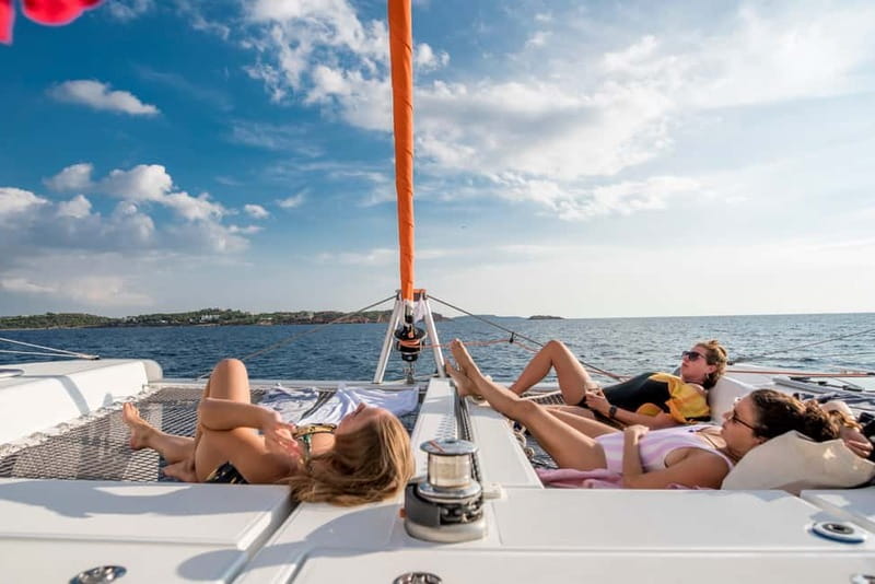 Athens: Half-Day Morning Catamaran Cruise with Meal & Drinks - Swimming, snorkeling, and quiet coves