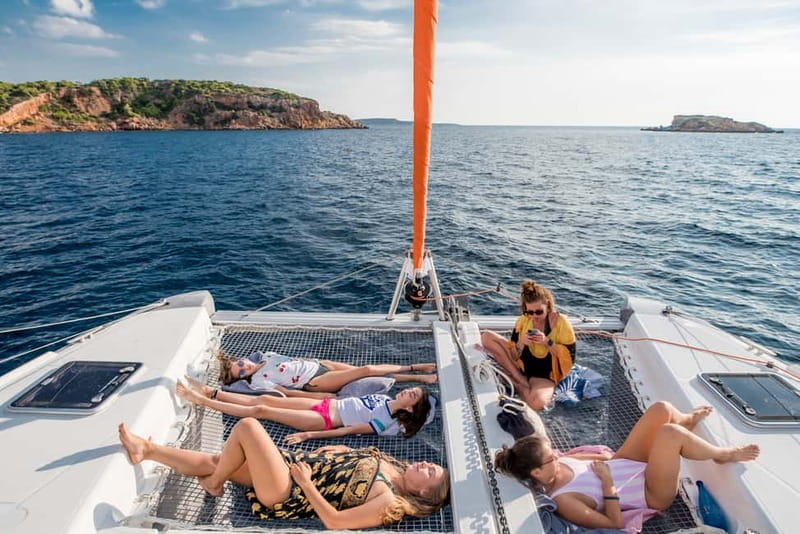 Athens: Half-Day Sunset Catamaran Cruise with Meal & Drinks - Swimming and snorkeling in the evening sea