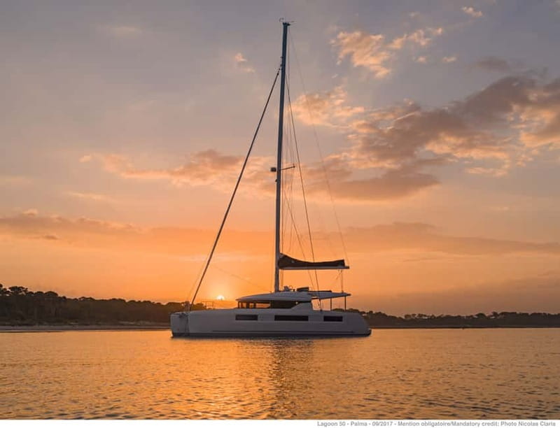 Athens: Half-Day Sunset Catamaran Cruise with Meal & Drinks - Boarding a modern catamaran from Athens