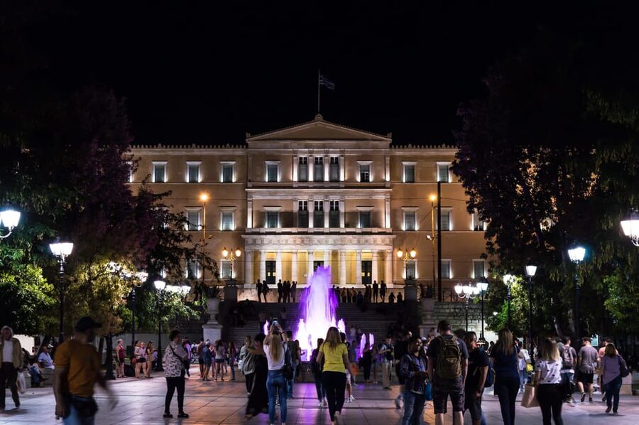 Athens: Night Walking Tour - Starting beneath the lights at Korai Square