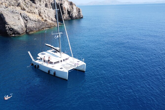 Athens Private Half day Catamaran cruise with meal & drinks - Vouliagmeni: Your Sheltered First Swim