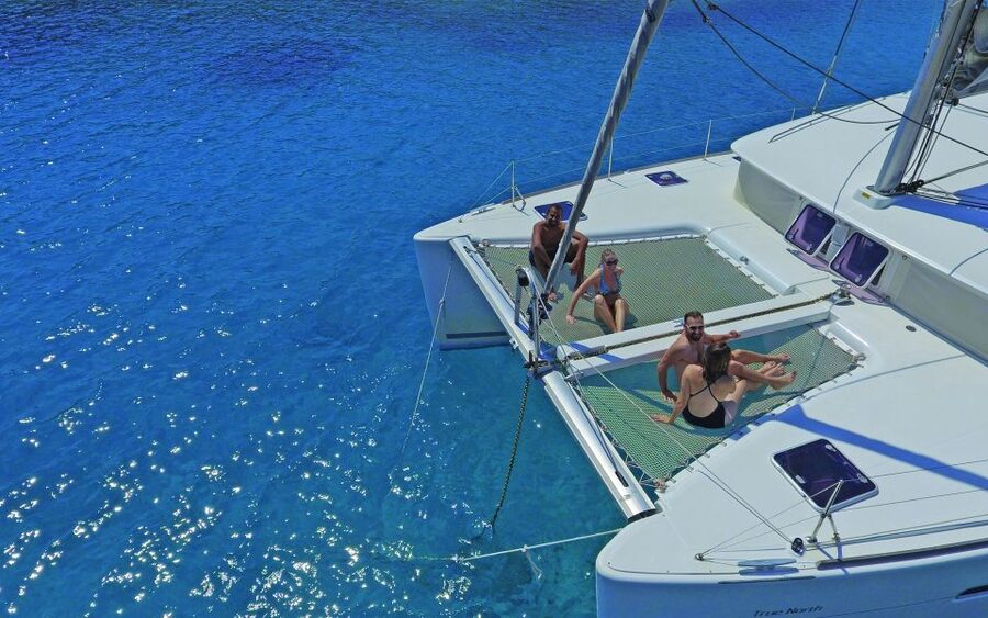 Athens: Riviera Catamaran Cruise with Meal and Drinks - First swim stop near Voula