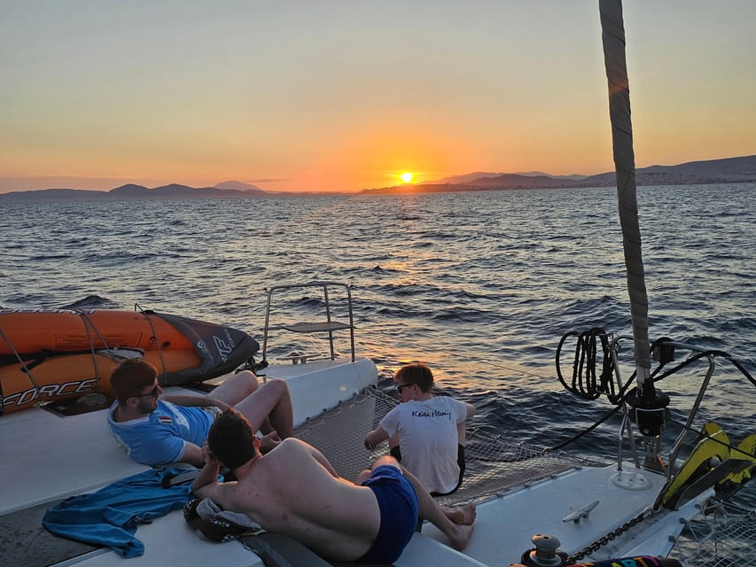 Athens: Riviera Catamaran Tour with Fresh Meal and Drinks - The Hydrousa stop: water time with room to choose