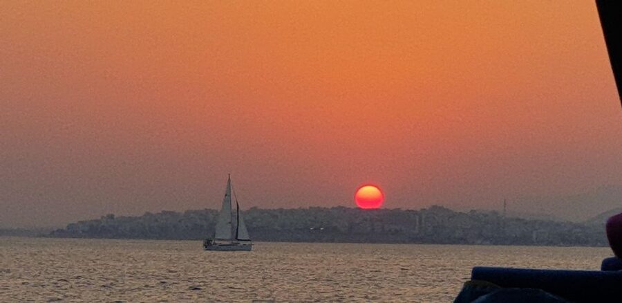 Athens: Riviera Catamaran Tour with Fresh Meal and Drinks - The return sail and sunset possibility