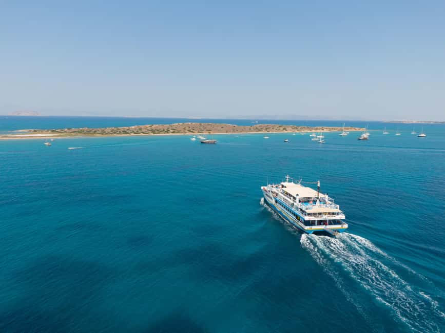 Athens: Swimming Cruise with Lunch, Wine & Live DJ on Board - Aegina adds island time and pistachio treats