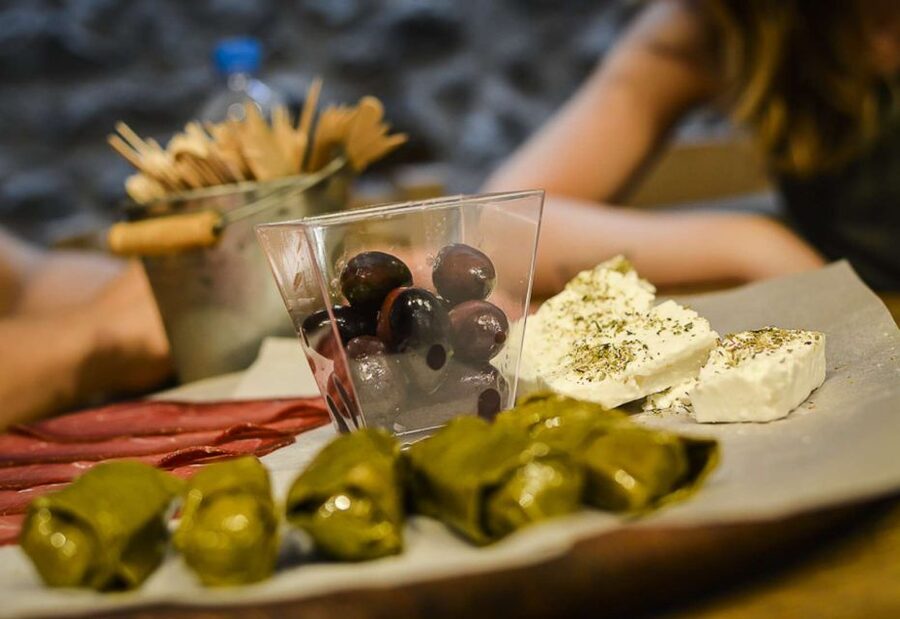 Athens: Ultimate Food Walking Tour with 15 Tastings - Cured meats, wine, and local spirits