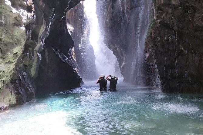 Canyoning in the water - Kourtaliotiko Gorge - Rappelling beside the river source