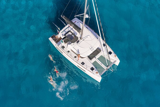 Catamaran Day & Sunset Cruises with meals Drinks and transportation - Sunset from the catamaran