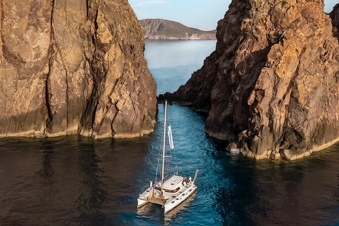 Catamaran Full-Day of Milos and Poliegos With Lunch & BBQ - Cape Vani and Milos’ Mining Past
