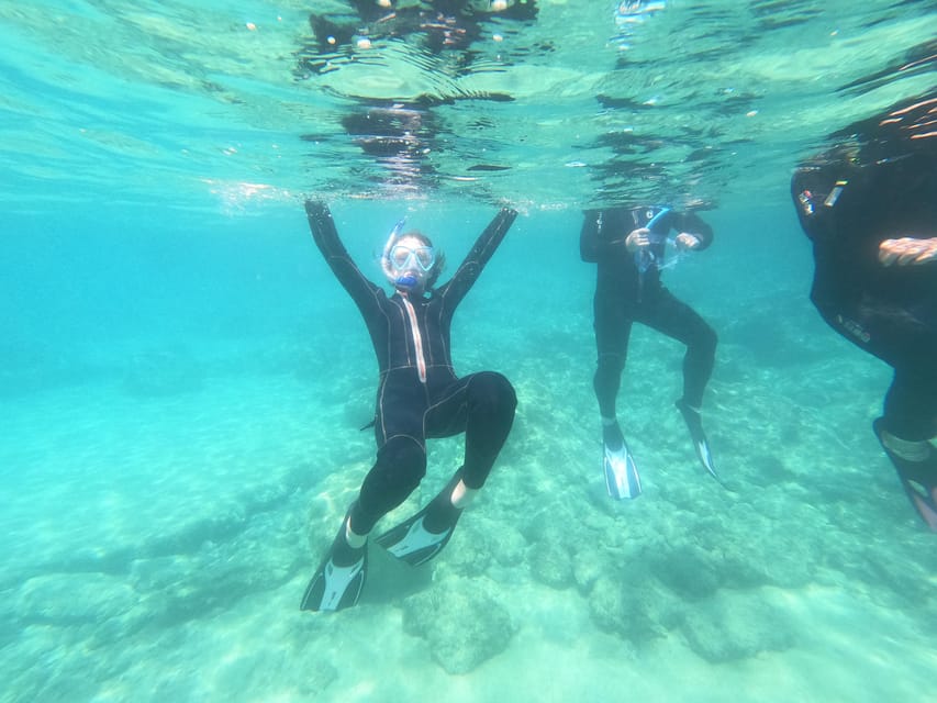 Chania: Boat Trip with Guided Snorkeling Tour - Getting fitted with a mask, fins, and wetsuit