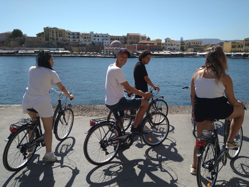 Chania: City Highlights Small Group Bike Tour - The Old Venetian Harbour, seen beyond the postcard