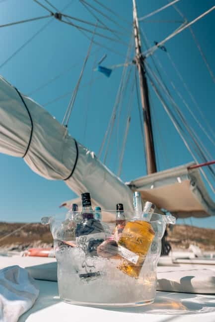 Corfu: Sunset Cruise on a Traditional Wooden Sailing Yacht - Mon Repos from the water