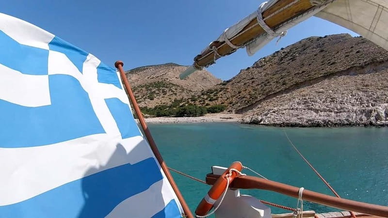 Corfu: Sunset Cruise on a Traditional Wooden Sailing Yacht - Local snacks and a drink on board