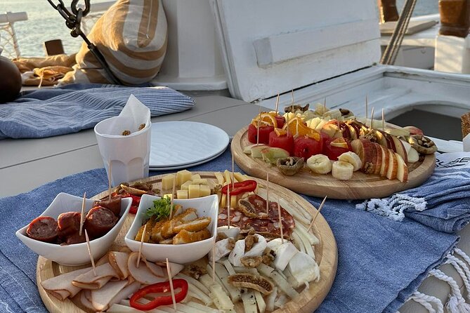 Corfu: Sunset Cruise on a Wooden Vessel with Cocktails & Bites - Mon Repos, royal connections, and ancient Paleopolis