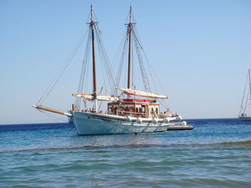 Corfu Town: Full-Day Cruise with Lunch, Drinks & Swim Stops - A Greek lunch served on deck