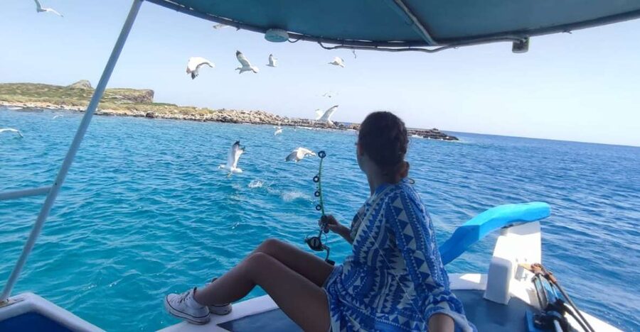 Crete: Fishing & Swimming Boat Cruise with Lunch & Drinks - Swimming and snorkeling in clear Elounda water