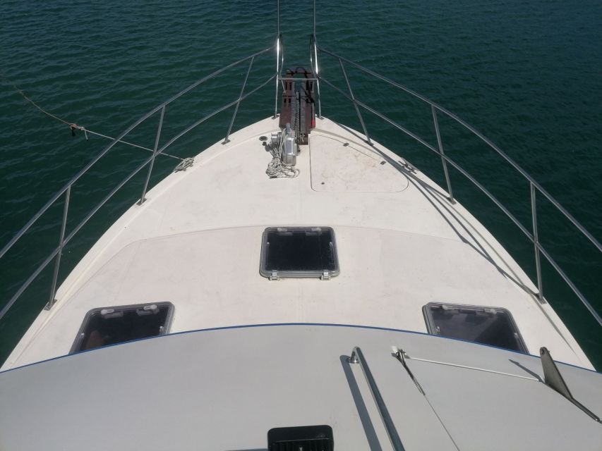 Crete: Snorkeling Boat Trip with Lunch and Transfer - The First Swim Stop: A Quick Taste of Open Water