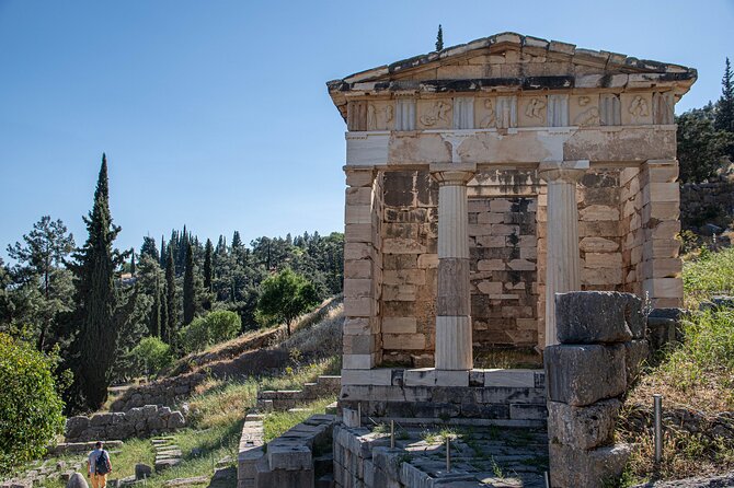 Delphi Skip-The-Line Private Tour with Licensed Guide & Admission - Walking the terraces toward Apollo’s temple