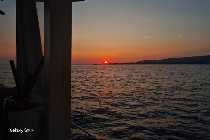 Dreamy Cruise sunset tour with dinner and unlimited wine! - Night swimming at Xi Beach