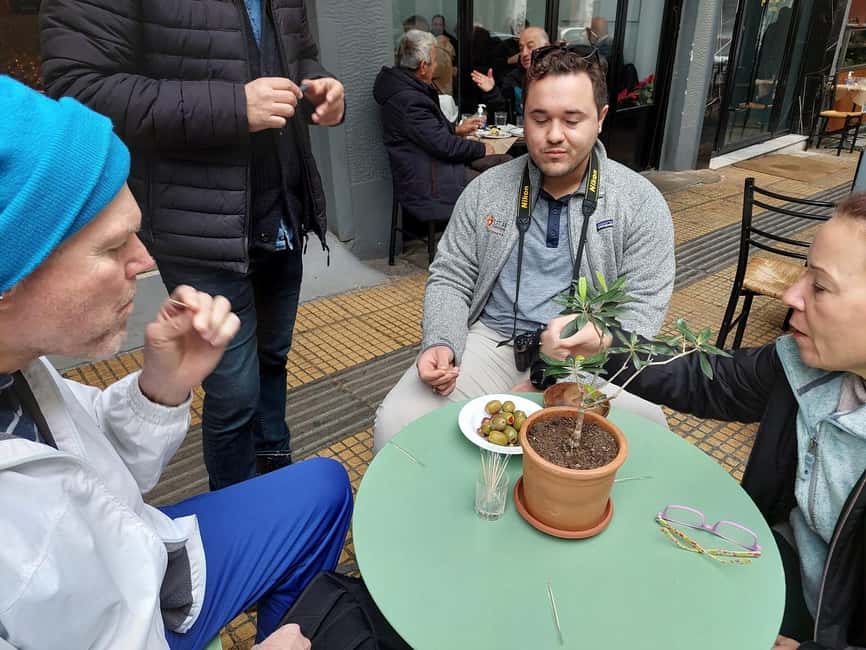 Eat Your Way Through Athens: A Local Food Walk - Tsipouro with cheese, sliced meat, olives, and oil