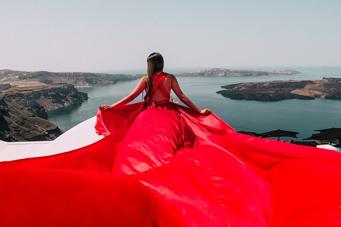 Exclusive Santorini Flying Dress Photoshoot with Pickup - Blue domes, rooftops, and the caldera