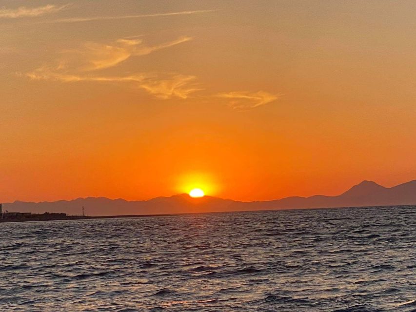 Faliraki: Evening RIB Cruise with Champagne and Sunset Views - Leaving the east coast and crossing toward Rhodes Town