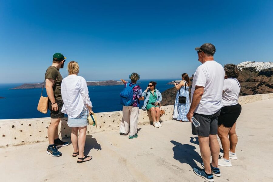Fira: Guided Foodie Walking Tour with Tastings - From the daily market to souvlaki