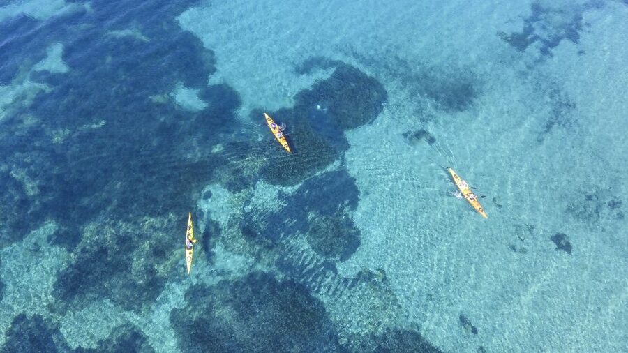 From Athens: Cape Sounion Guided Kayaking Tour with Lunch - Arriving beneath the Temple of Poseidon