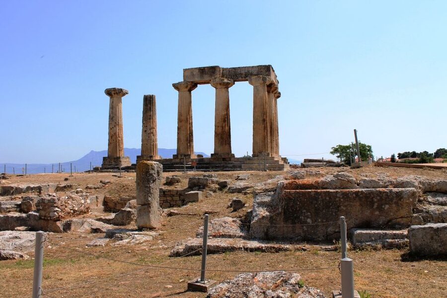 From Athens: Half-Day Ancient Corinth Tour - Reading the remains of ancient Corinth