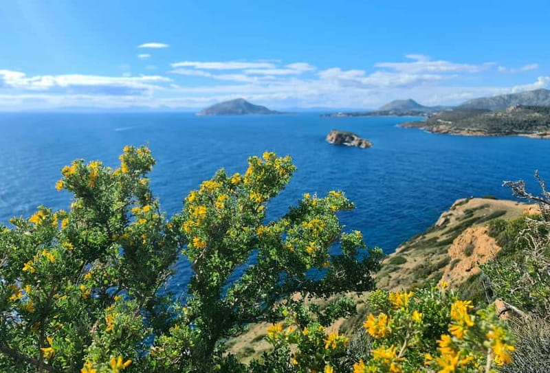 From Athens: Temple of Poseidon & Cape Sounion Half-Day Tour - Reaching the cliffs at Cape Sounion