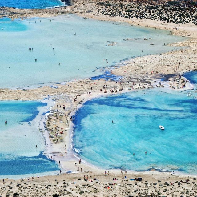 From Chania: Day Trip to Elafonisi Island Pink Sand Beach - Walking across the shallow water to the island
