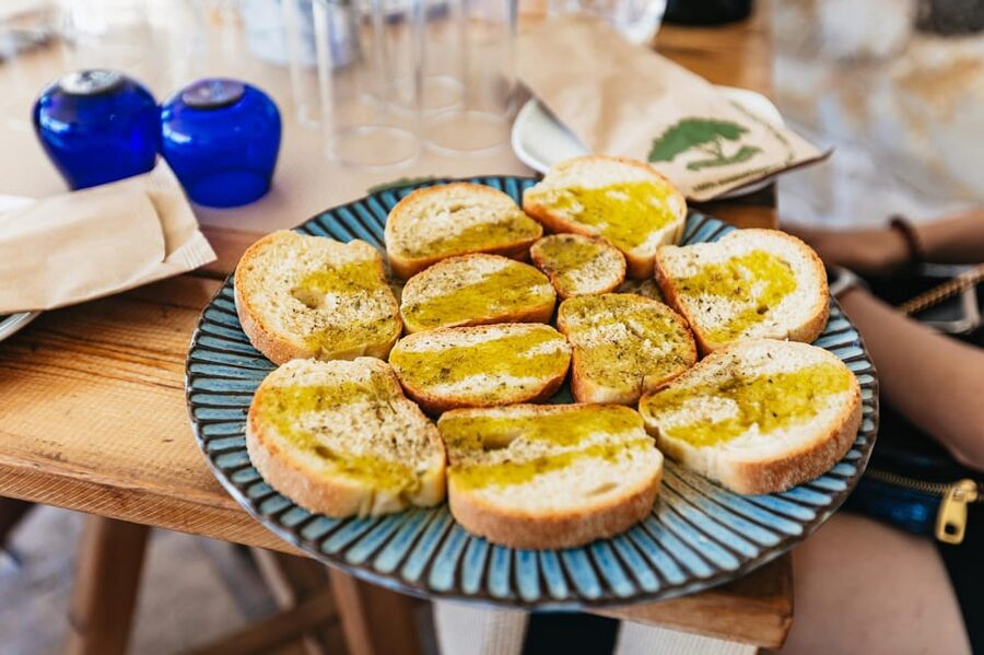 From Chania: Wine and Olive Oil Tasting Tour with Snacks - A 3,000-year-old olive tree in a traditional village