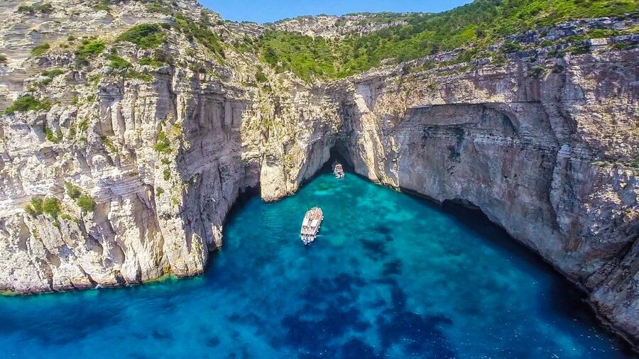 From Corfu: Day Cruise to Paxos, Antipaxos, and Blue Caves - Sailing past Corfu’s old town