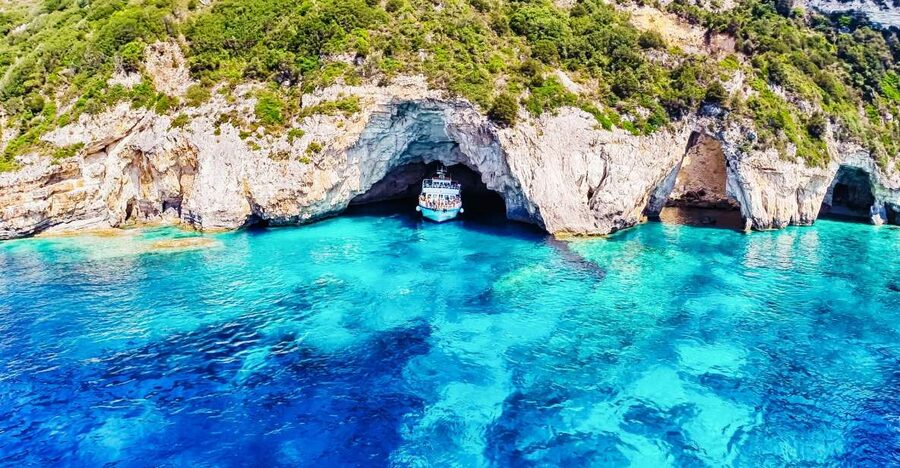 From Corfu: Day Cruise to Paxos, Antipaxos, and Blue Caves - Guides, languages, and the onboard mood