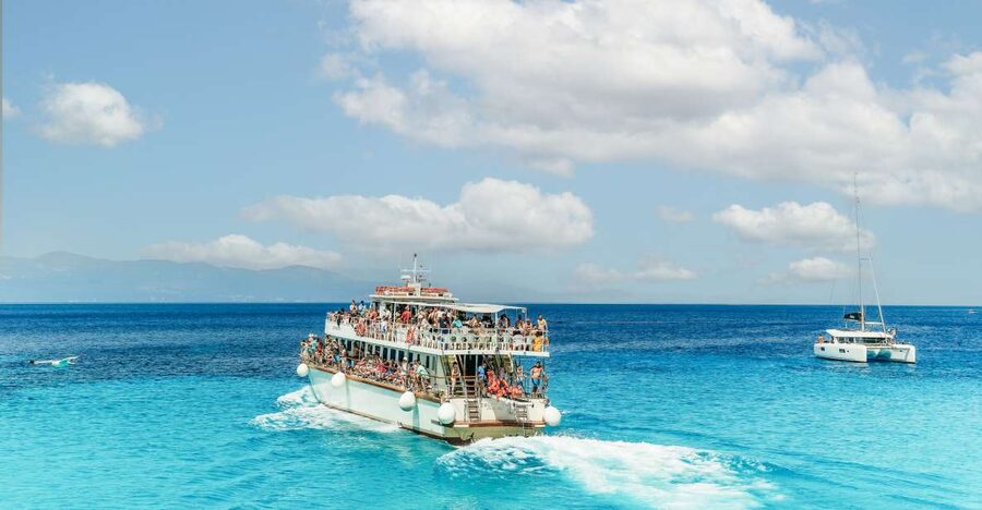 From Corfu Island: Antipaxos & Paxos Blue Caves Boat Cruise - Lakka: two hours to explore Paxos on your own