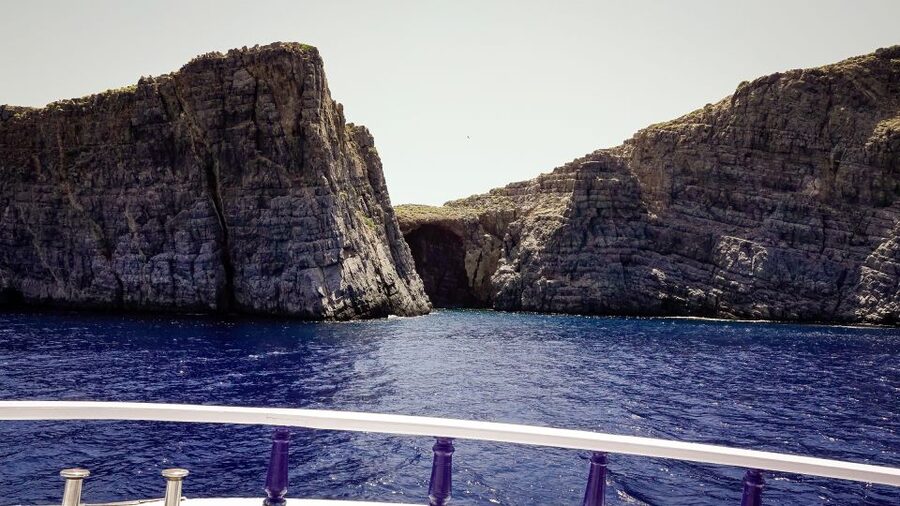 From Heraklion: Elounda, Kolokitha, and Spinalonga Boat Trip - Kolokitha Beach brings the classic Crete postcard