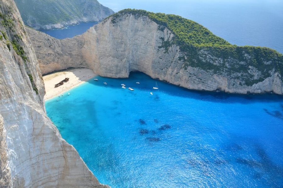 From Kefalonia: Blue Cave Boat Cruise & Shipwreck Photo Stop - Alykanas, one hour of village and beach time