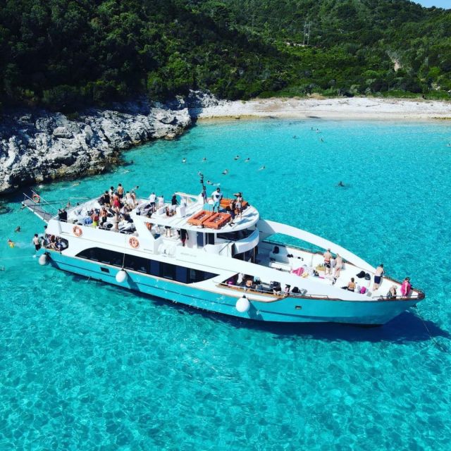 From Lefkimmi: Syvota, Blue Lagoon and Cave Sunset Cruise - Entering Sivota Cave by boat