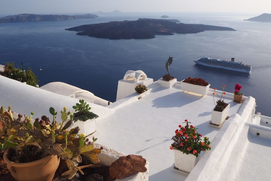 From Naxos: Full-Day Boat Trip to Santorini - The bus ride and guide arrangements