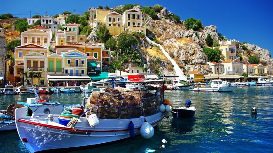 From Rhodes: Boat Trip to Symi Island with Hotel Transfer - Walking the town and looking for sponges