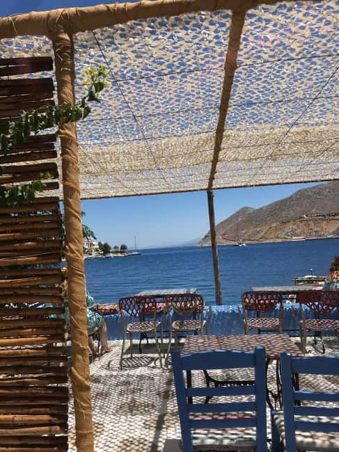 From Rhodes: Symi Island and Panormitis Monastery Day Trip - Arriving in Symi Town