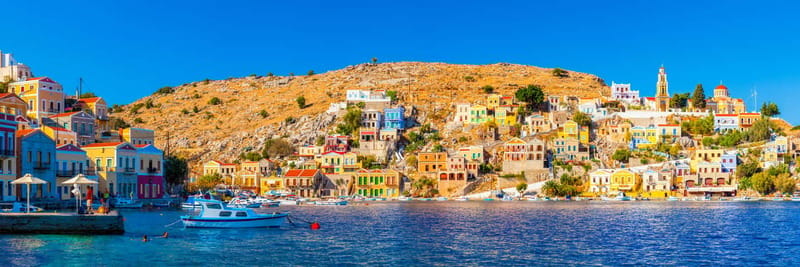 From Rhodes: Symi Island Day Trip by Boat with Hotel Pickup - Hotel pickup and the trip to Rhodes harbor