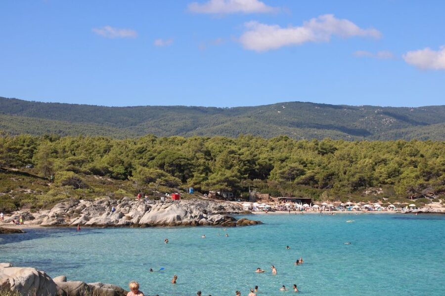 From Thessaloniki: Sithonia Beaches and Scenic Villages Tour - Karydi Beach starts the day with pale sand and shallow water